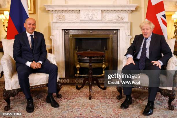 Britain's Prime Minister Boris Johnson talks with Slovenia's Prime Minister Janez Jansa during their meeting inside 10 Downing Street on September...