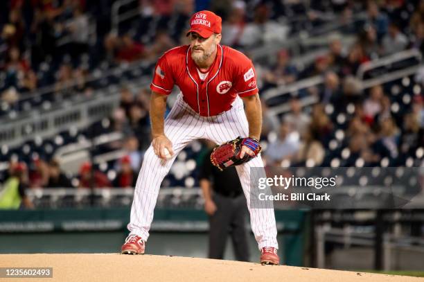 Rep. Greg Steube, R-Fla., pitches for the Republicans during the Congressional Baseball Game at Nationals Park in Washington on Wednesday, Sept. 29,...