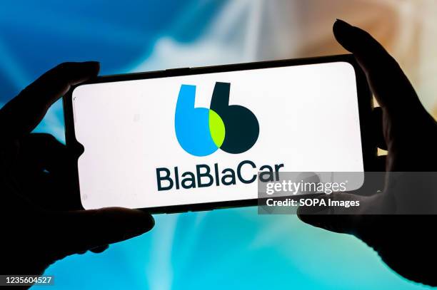 In this photo illustration a BlablaCar logo seen displayed on a smartphone.