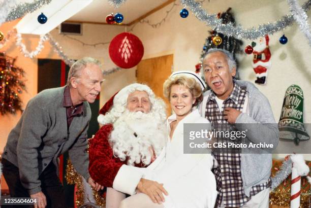 Pictured from left is Ray Walston , Kirk Douglas , Elizabeth Montgomery and Pat Morita in a made for television movie, AMOS. Broadcast September 29,...
