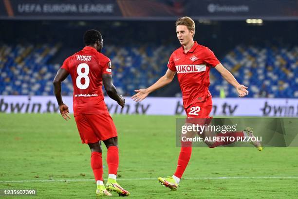 Spartak Moscow's Russian midfielder Mikhail Ignatov celebrates with Spartak Moscow's Nigerian forward Victor Moses after scoring during the UEFA...