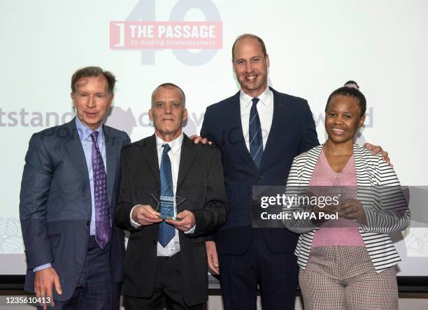 Prince William, Duke of Cambridge, Royal Patron of The Passage, [poses for a photo with Award winners Colin Chilman formerly homeless and now a...