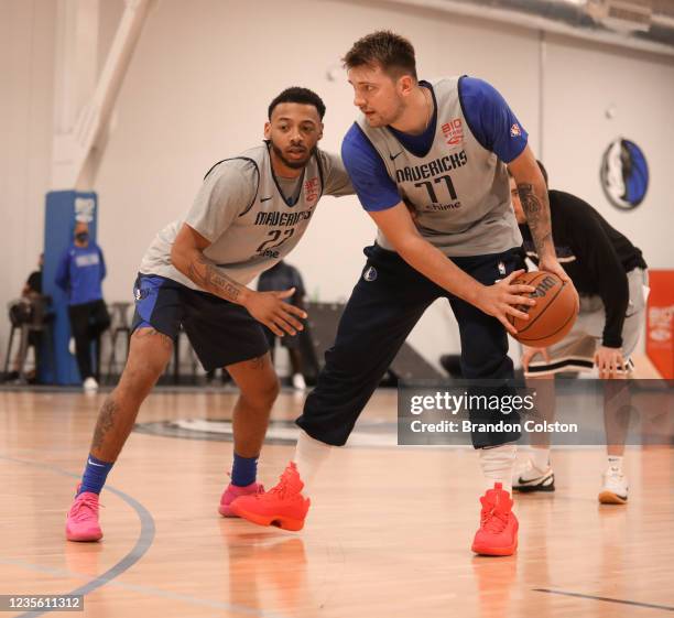 Carlik Jones of the Dallas Mavericks plays defense against on Luka Doncic of the Dallas Mavericks during open practice on September 29, 2021 at the...