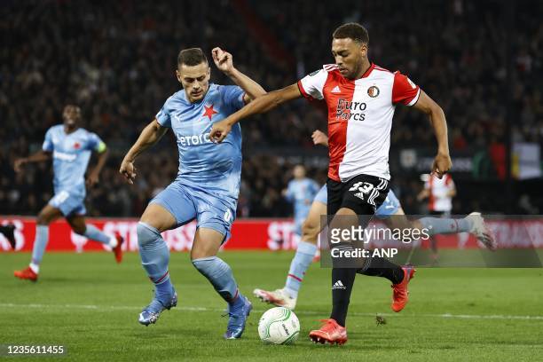 Tomas Holes of Slavia Prague, Cyriel Dessers of Feyenoord during the Conference League match between Feyenoord and Slavia Prague at Feyenoord Stadium...