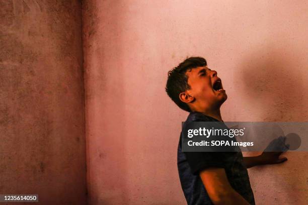 Relative mourning during the funeral of Palestinian Muhammad Abu Ammar, who was shot dead by Israeli soldiers at the border fence between Israel and...