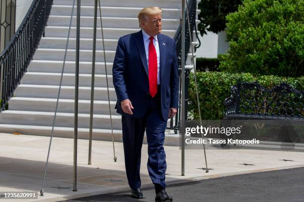 President Donald Trump walks out of the White House as he heads to the SpaceX launch in Florida on May 30, 2020 in Washington, DC. President Donald...