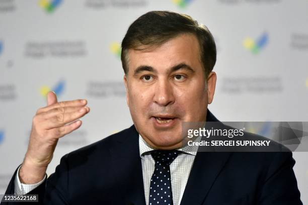Photograph taken on March 19 shows former Georgian President Mikheil Saakashvili gesturing during a press conference, in Kiev. - Georgia's flamboyant...