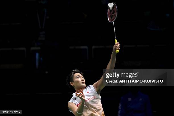 Kento Momota of Japan plays during his match against Tien Chen Chou of Chinese Taipei during the men's singles match at the quarter-finals between...