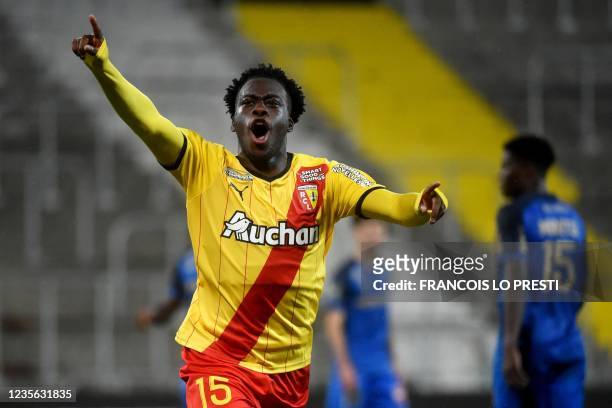 Lens' French forward Arnaud Kalimuendo celebrates after scoring the opener during the French L1 football match between RC Lens and Stade de Reims at...
