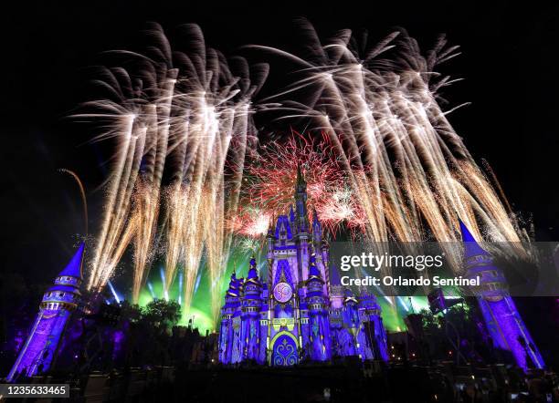 Fireworks illuminate Cinderella Castle at the Magic Kingdom marking the 50th anniversary of Walt Disney World, in Lake Buena Vista, Fla., on Sept....