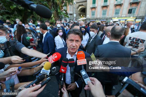 Giuseppe Conte, president of the 5 Star Movement, talks with journalists before a political rally for the administrative elections in Naples, in...