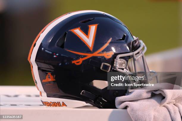 Virginia Cavaliers helmet resting on a Gatorade cooler during a game between the Wake Forest Demon Deacons and the Virginia Cavaliers on September 24...