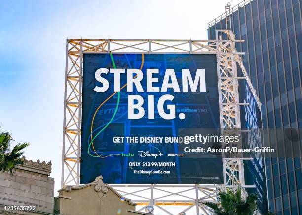 General view of a Disney streaming services billboard above the El Capitan Entertainment Centre promoting their combined content of Disney+, Hulu,...