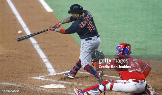 Jose Ramirez of the Cleveland Indians singles and drives in two runs against the Texas Rangers during the third inning at Globe Life Field on October...