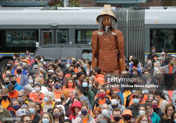 People take part in a commemoration event during the first National Day for Truth and Reconciliation in Vancouver, British Columbia, Canada, on Sept....