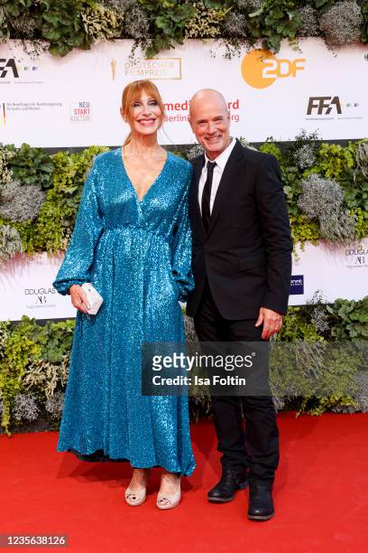German actress Andrea Sawatzki and her husband German actor Christian Berkel attend the Lola - German Film Award red carpet at Palais am Funkturm on...