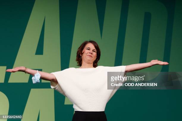 Co-leader of Germany's Greens Annalena Baerbock greets delegates at the start of a small-scale congress of Germany's Green Party on the outcome of...