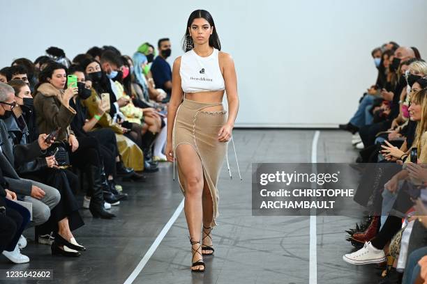 Model presents a creation by Ester Manas during the Women's Spring-Summer 2022 Ready-to-Wear collection fashion show in Paris, as part of the Paris...