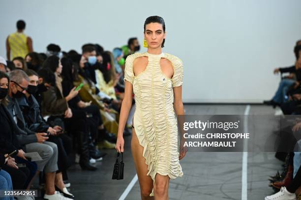Model presents a creation by Ester Manas during the Women's Spring-Summer 2022 Ready-to-Wear collection fashion show in Paris, as part of the Paris...