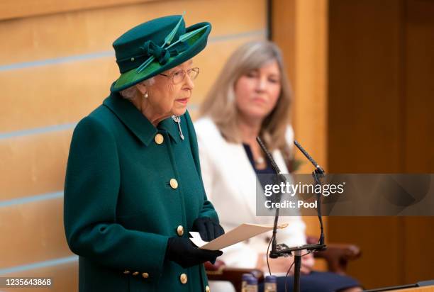 Britain's Queen Elizabeth II delivers a speech in the debating chamber of the Scottish Parliament in Edinburgh to mark the official start of the...