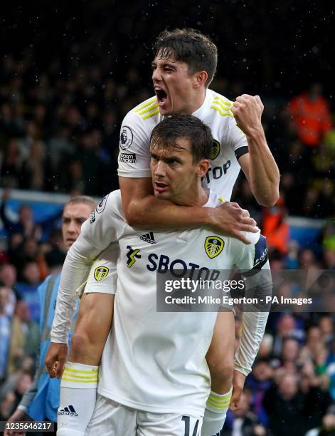 Leeds United's Diego Llorente celebrates with Daniel James after scoring their side's first goal of the game during the Premier League match at...