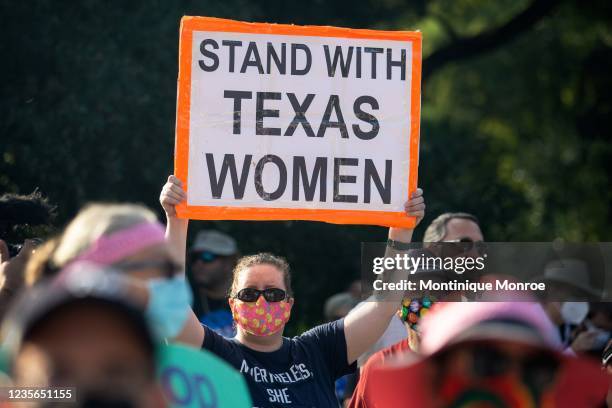 Demonstrators rally against anti-abortion and voter suppression laws at the Texas State Capitol on October 2, 2021 in Austin, Texas. The Women's...