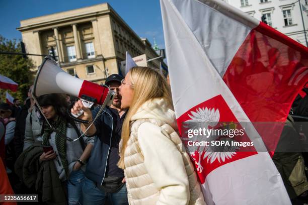 Protester chants slogans on a megaphone during the demonstration. Hundreds of people took part in the annual March of Freedom and Sovereignty under...