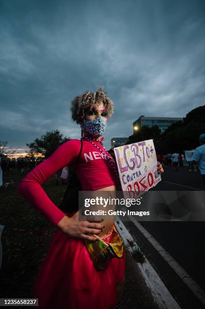 Member of the LGBTQ+ community poses during a demonstration as part of the protests against President of Brazil Jair Bolsonaro around the country on...