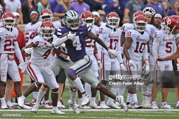 Wide receiver Malik Knowles of the Kansas State Wildcats returns a kick-off 94 yards for a touchdown during the second half against Oklahoma Sooners...