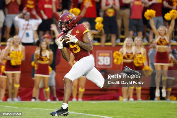 Wide receiver Xavier Hutchinson of the Iowa State Cyclones pulls in a pass for a touchdown in the end zone in the first half of play against the...