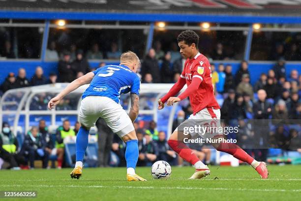 Brennan Johnson of Nottingham Forest and Kristian Pedersen of Birmingham City during the Sky Bet Championship match between Birmingham City and...