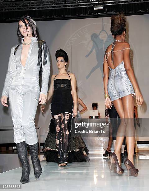 Models walk the runway for Made in LA presents "Bebe: The After Party" for Los Angeles fashion week spring 2011 at SupperClub Los Angeles on March...
