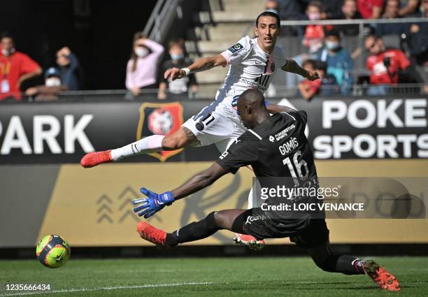 Paris Saint-Germain's Argentinian midfielder Angel Di Maria challenges Rennes' Senegalese goalkeeper Alfred Gomis during the French L1 football match...