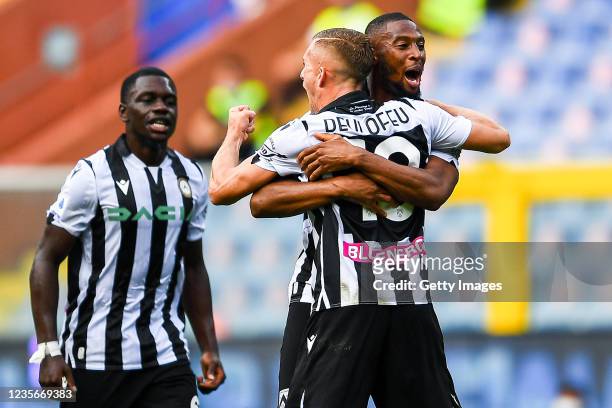 Beto Betuncal of Udinese celebrates with his team-mates Jean Makengo and Gerard Deulofeu after scoring a goal during the Serie A match between UC...