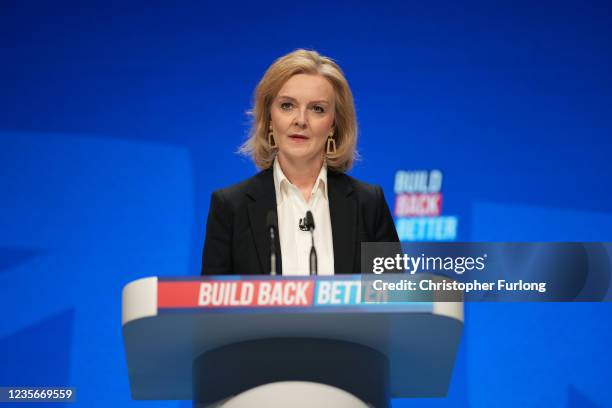 Foreign Secretary Liz Truss delivers a speech on day one of the annual Conservative Party Conference at Manchester Central on October 03, 2021 in...