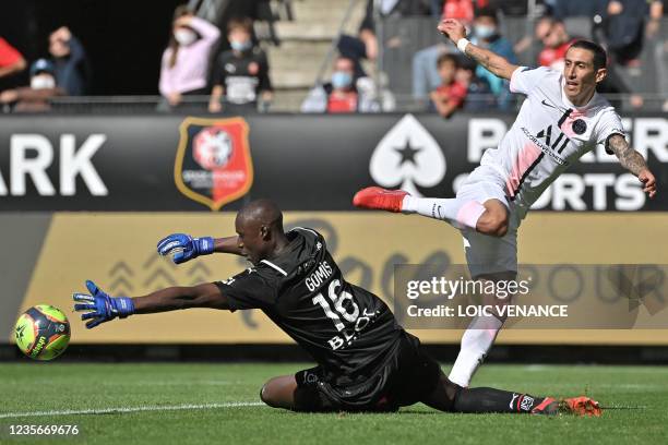 Paris Saint-Germain's Argentinian midfielder Angel Di Maria fights for the ball with Rennes' Senegalese goalkeeper Alfred Gomis during the French L1...