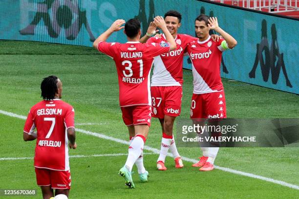Monaco's French forward Wissam Ben Yedder celebrates with team mates after scoring a goal during the French L1 football match between Monaco and...