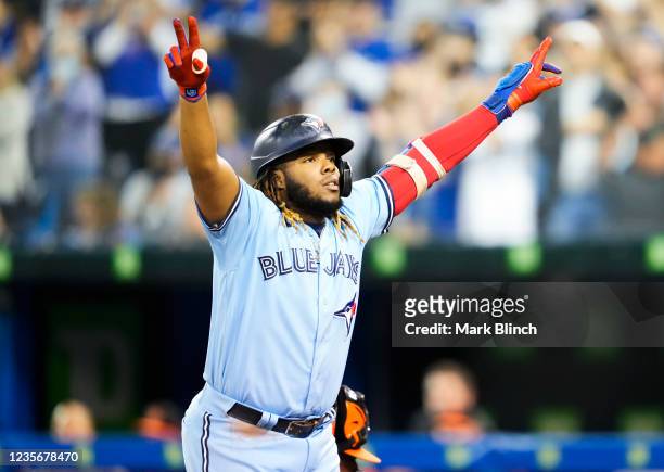 Vladimir Guerrero Jr. #27 of the Toronto Blue Jays celebrates his home run against the Baltimore Orioles in the second inning during their MLB game...