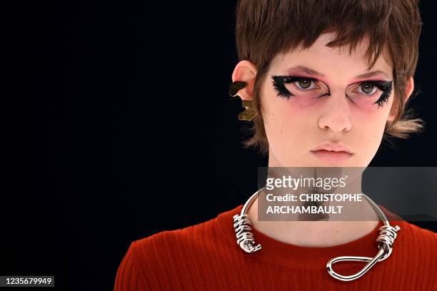 Model presents a creation, wearing a noose necklace, for Givenchy during the Women's Spring-Summer 2022 Ready-to-Wear collection fashion show in...