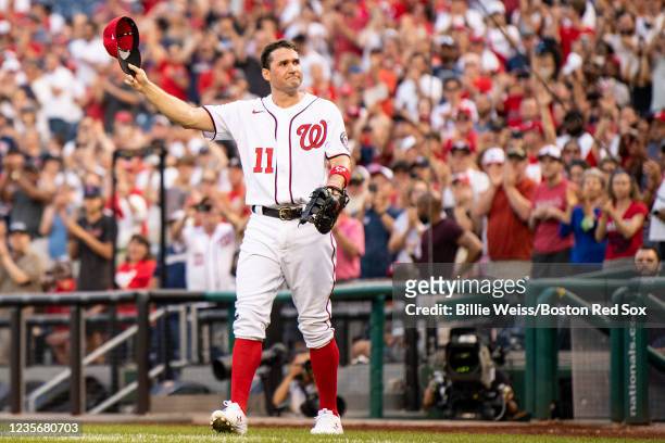Ryan Zimmerman of the Washington Nationals reacts as he receives an ovation as he exits the game during the eighth inning against the Boston Red Sox...
