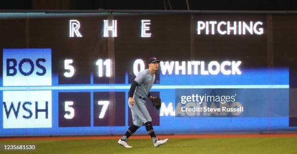 Toronto, ON- October 3 - Toronto Blue Jays left fielder Corey Dickerson plays with a scoreboard behind him as the Toronto Blue Jays beat the...