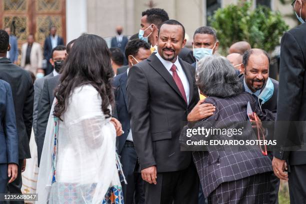 Abiy Ahmed , Prime Minister of Ethiopia, looks on after being reelected Prime Minister during a swearing-in ceremony at the parliament, in the city...