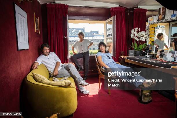 Writers Nicholas Poiret, Sylvie Poiret and Nathalie Serrault are photographed for Paris Match at the Palais-Royal theatre on September 7, 2021 in...