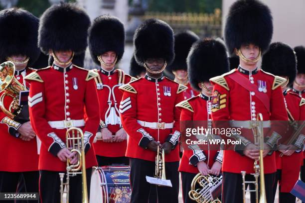 Soldiers from the 1st Battalion Coldstream Guards take part in the Changing of the Guard in the forecourt of Buckingham Palace on October 4, 2021 in...