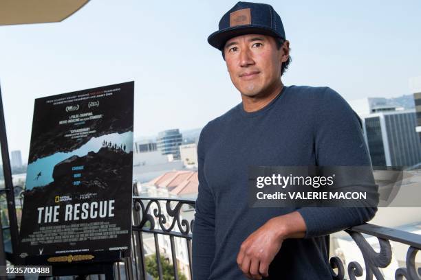 Filmmaker Jimmy Chin poses during the press day for his new documentary "The Rescue", in Beverly Hills, California, September 20, 2021. - After their...