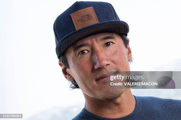 Filmmaker Jimmy Chin poses during the press day for his new documentary "The Rescue", in Beverly Hills, California, September 20, 2021. - After their...