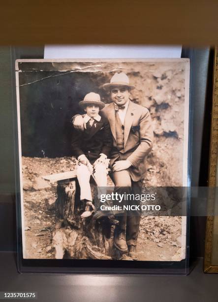 Photograph of Al Capone with his son, Sonny, is displayed at Witherell's auction house in Sacramento, California on October 4, 2021. - Guns once...