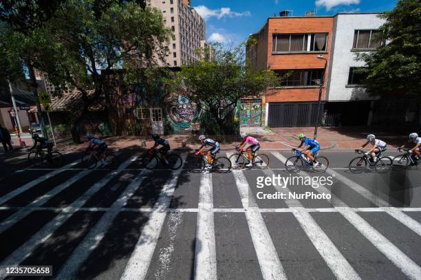 Participants pass through the Perseverancia neighborhood during the last stage finals of the Vuelta a Colombia Femenina 2021 in Bogotá, Colombia,...