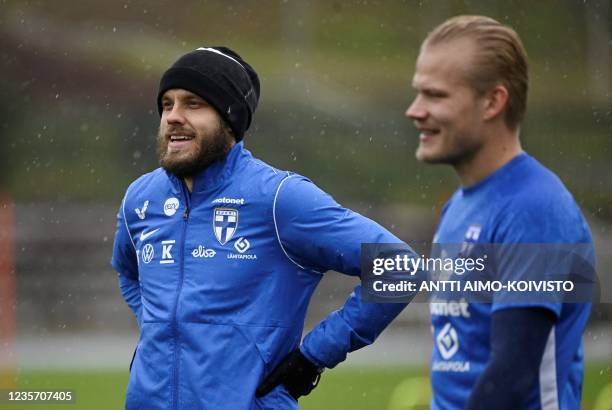 Teemu Pukki and Joel Pohjanpalo, players of the Finnish national football team, attend a practise session in Espoo, Finland on October 5, 2021. - The...