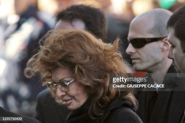 Italian actress Sophia Loren and his son Eduardo arrive at funeral of her husband Carlo Ponti at San Martin church 12 January 2007 in Magenta,...